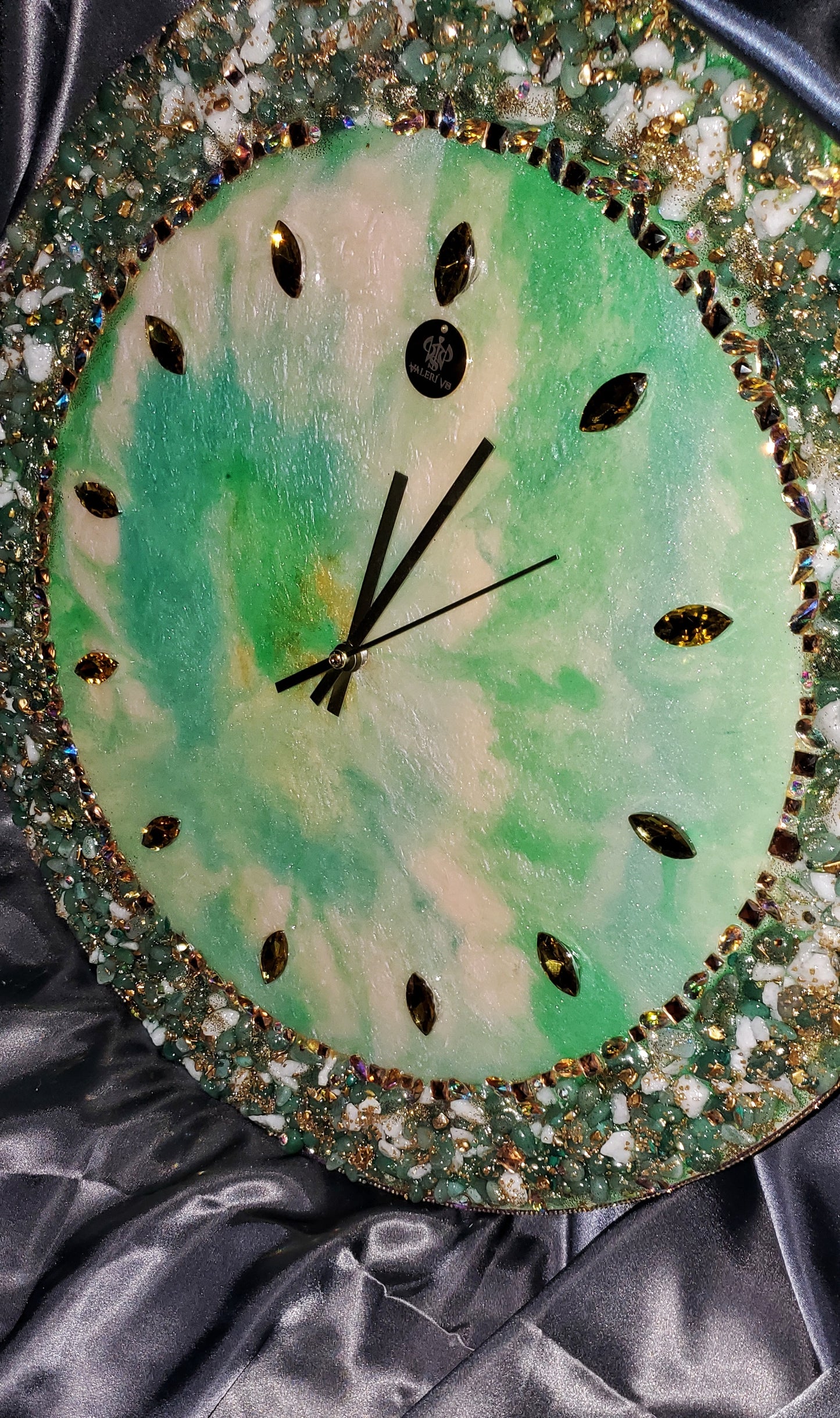 Green luxury wall clock with natural stones and crystals